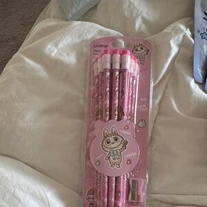 NWT Pink Labubu Pencils Set with sharpener.